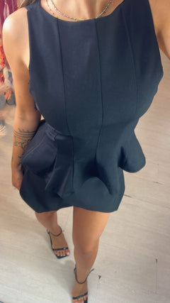 Top smanicato peplum